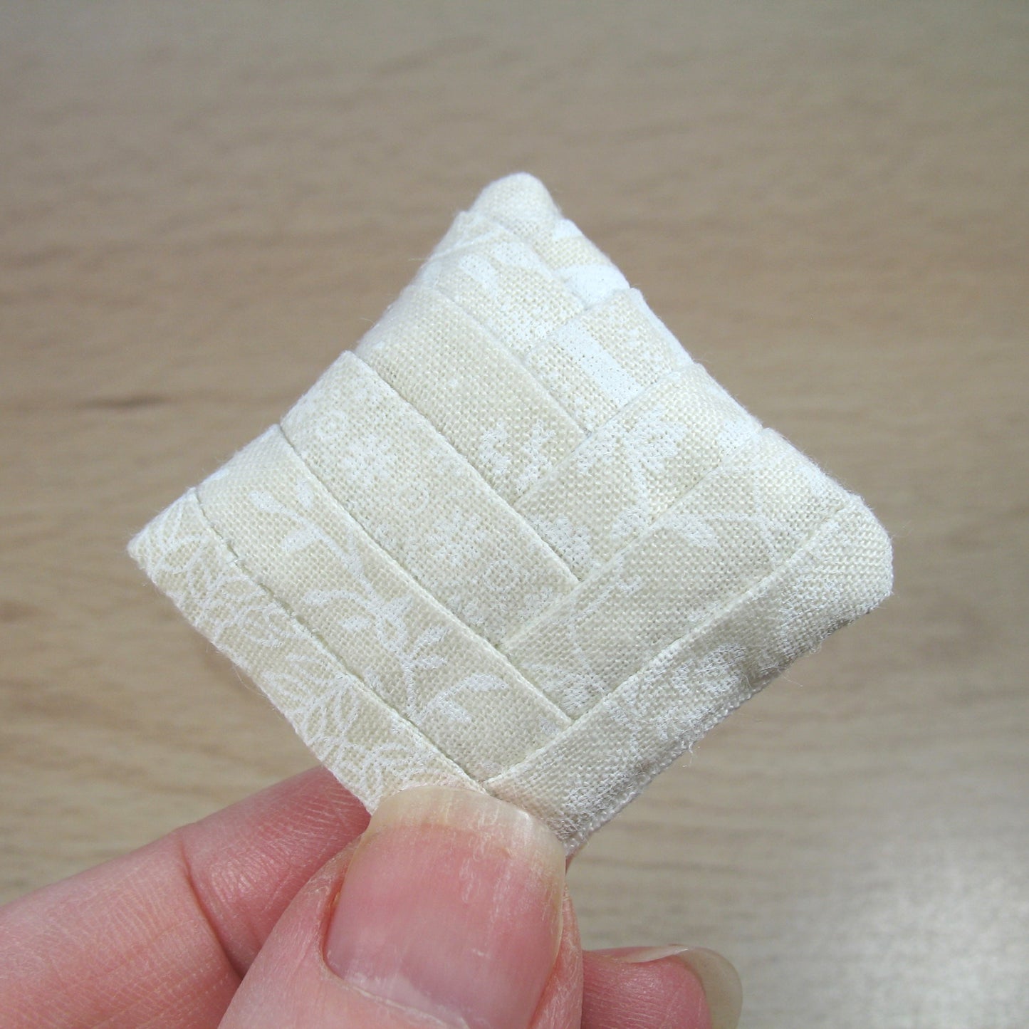 Cream and White Patchwork Cushion